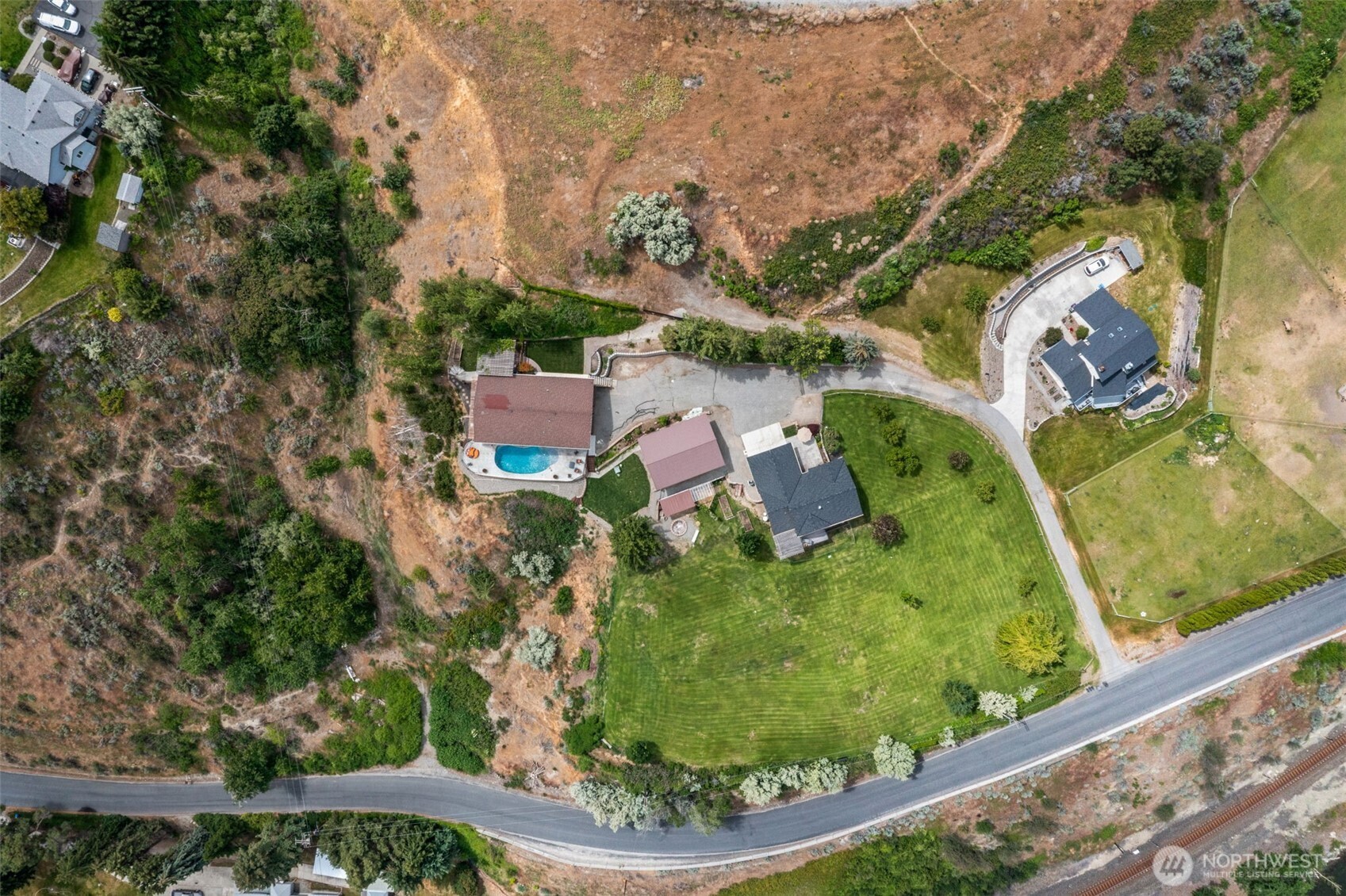 1901 Sleepy Hollow Road Wenatchee, WA 98801 - Photo 40 of 40 an aerial view of residential house with outdoor space and trees all around