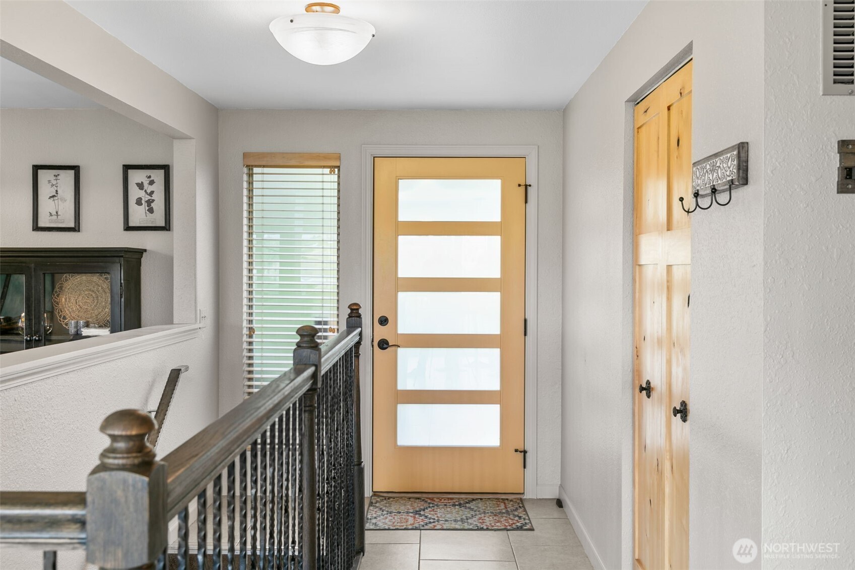 1901 Sleepy Hollow Road Wenatchee, WA 98801 - Photo 8 of 40 a view of an entryway with wooden floor and windows