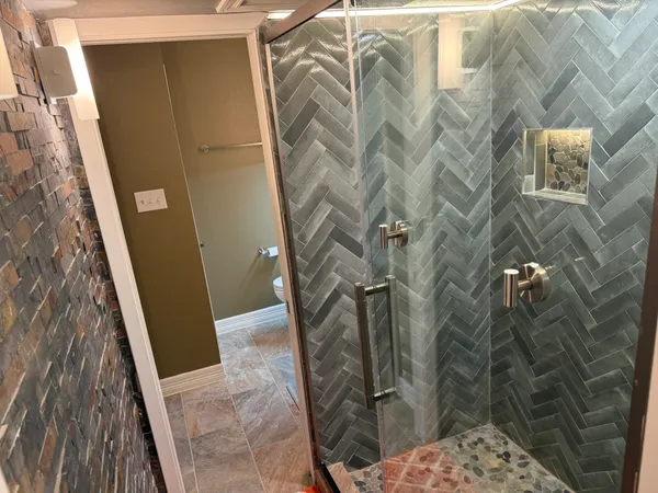 a bathroom with a sink and mirror