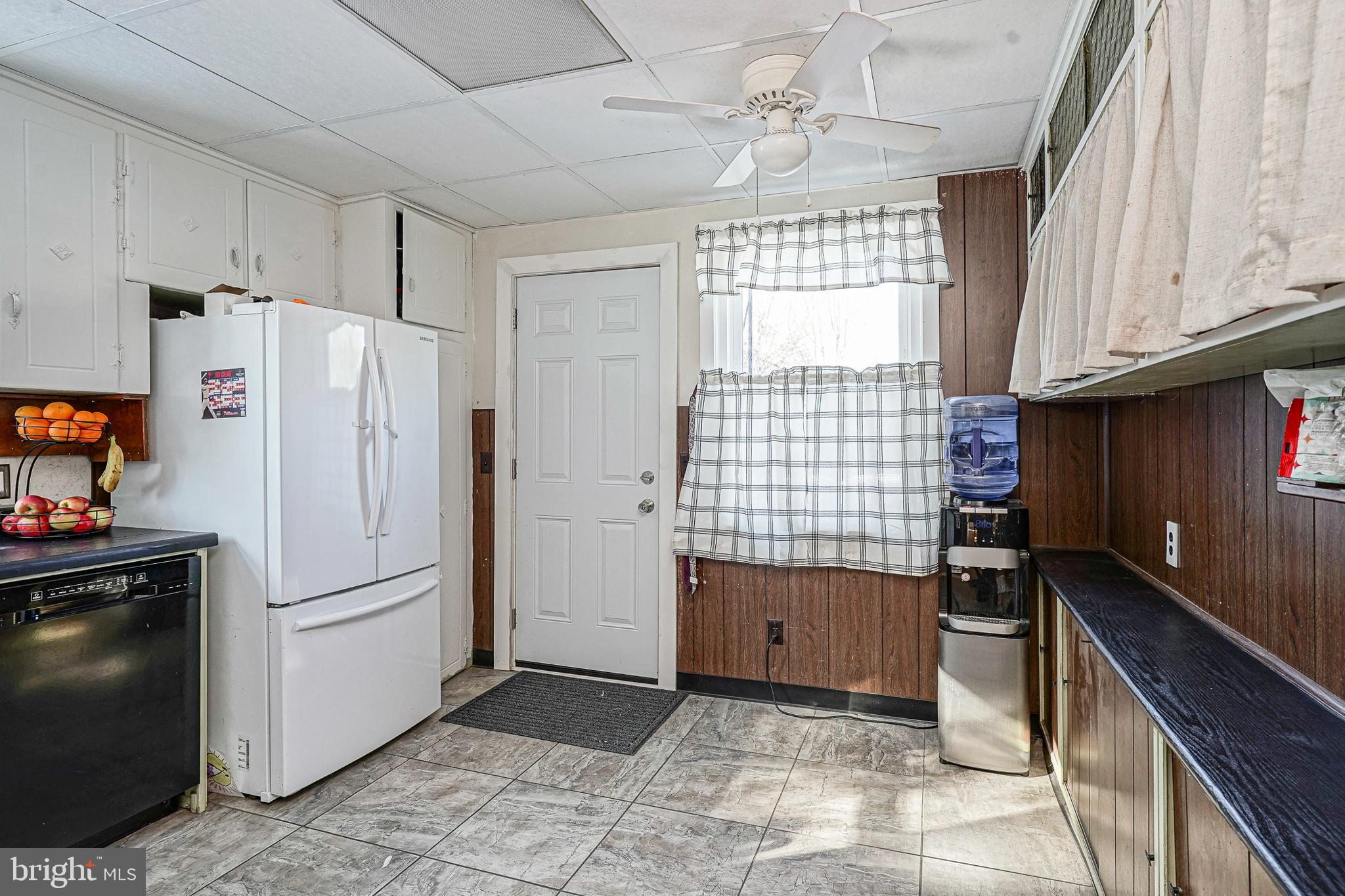 1345 East Walnut Road Vineland, NJ 08361 - Photo 11 of 26 a kitchen with a refrigerator and a sink