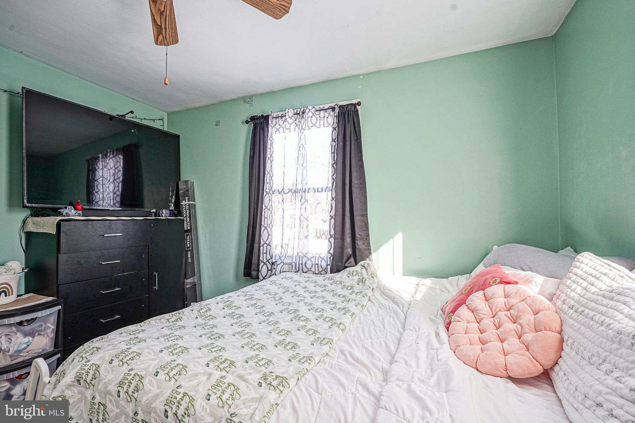 1345 East Walnut Road Vineland, NJ 08361 - Photo 15 of 26 a bedroom with a bed and a flat tv screen on dresser