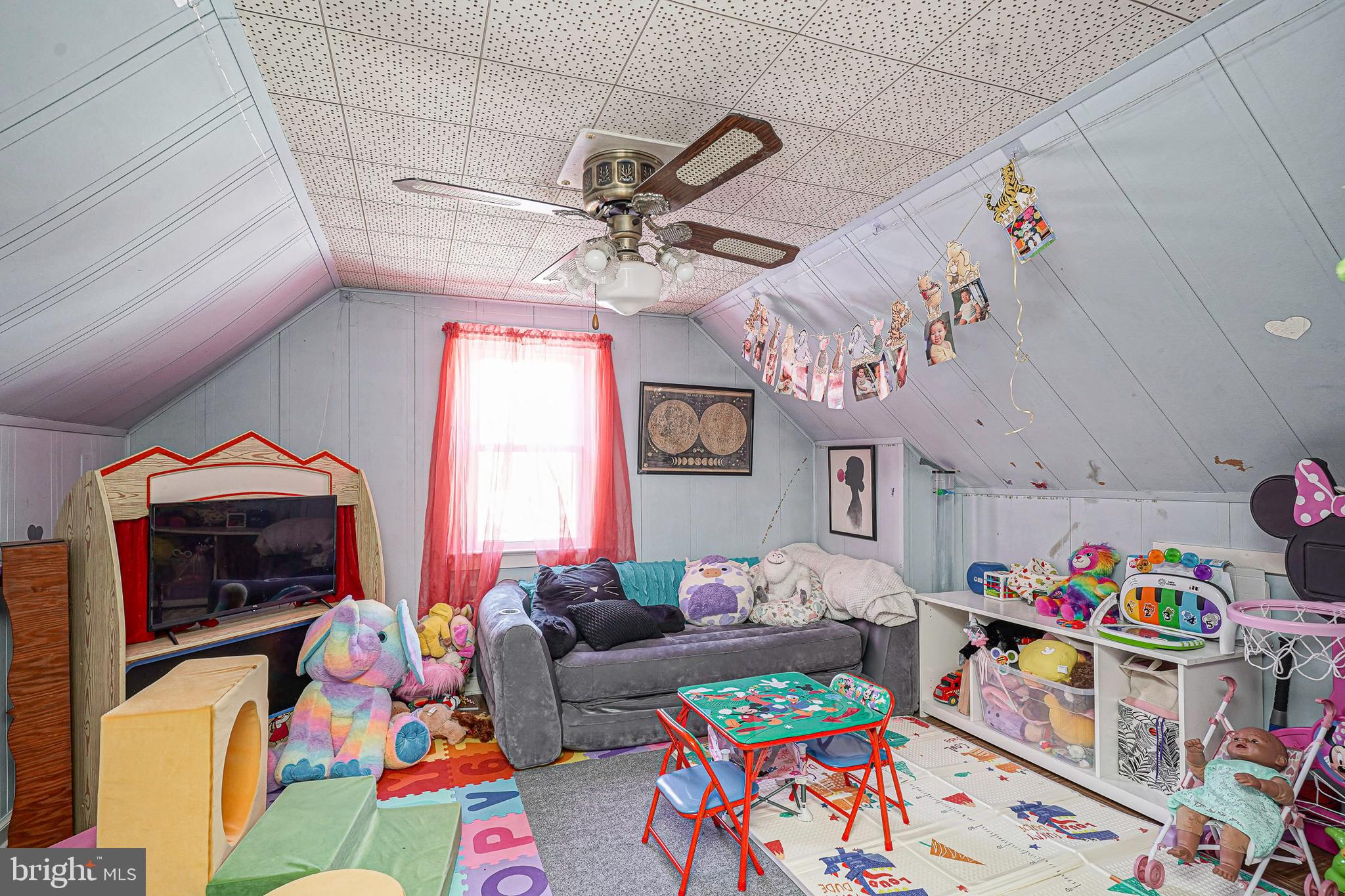 1345 East Walnut Road Vineland, NJ 08361 - Photo 17 of 26 a living room filled with furniture and a baby crib
