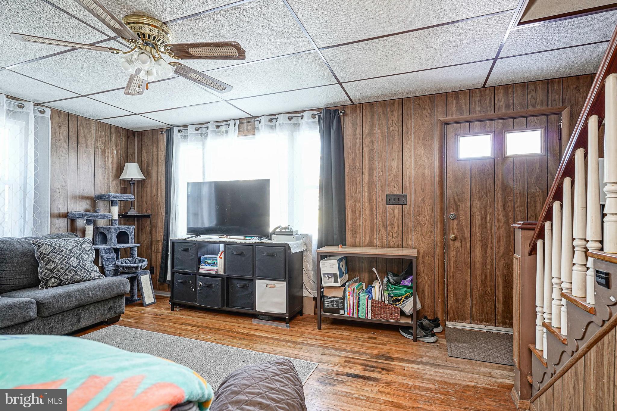 1345 East Walnut Road Vineland, NJ 08361 - Photo 6 of 26 a living room with furniture and a flat screen tv