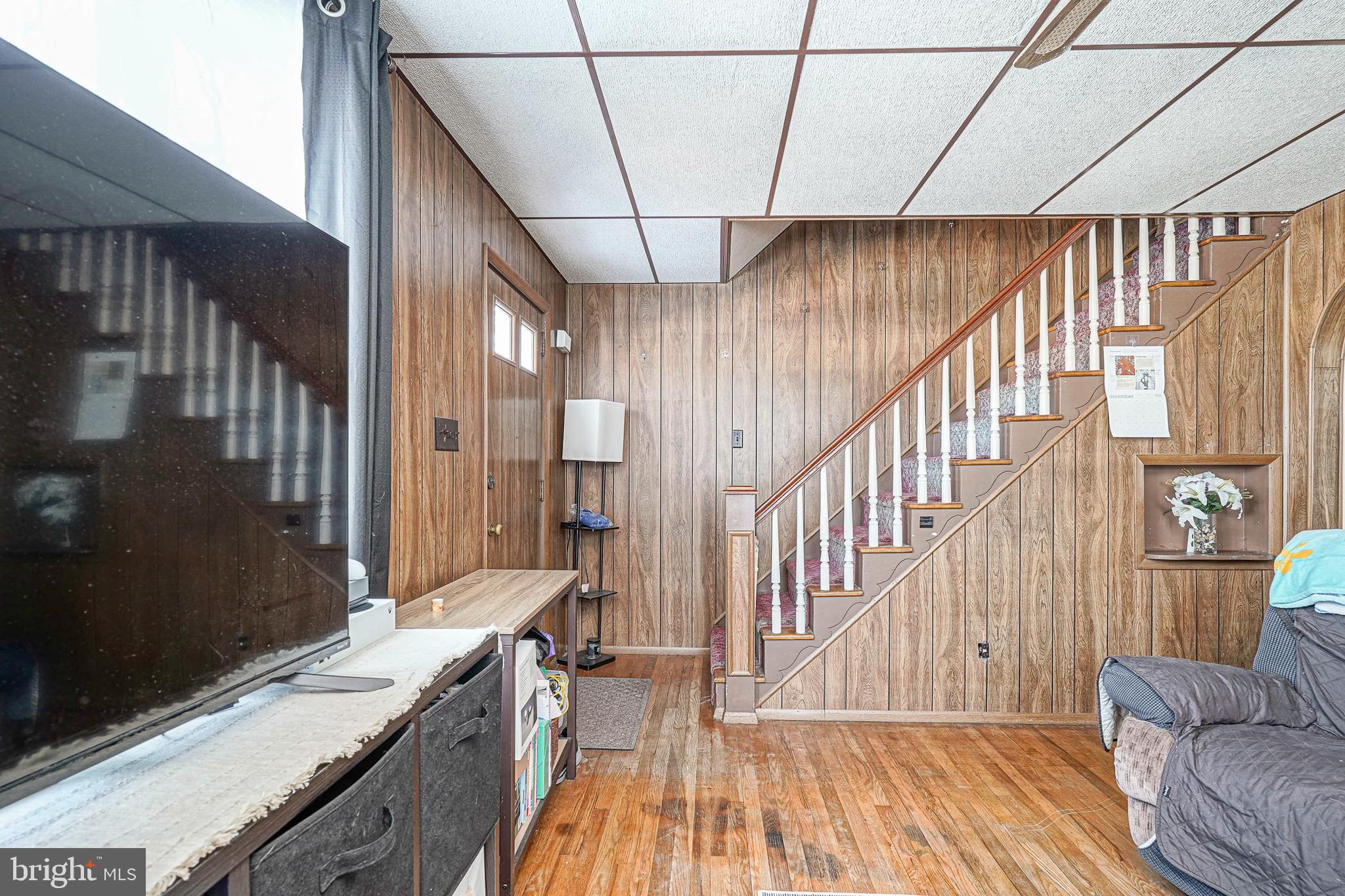 1345 East Walnut Road Vineland, NJ 08361 - Photo 7 of 26 a view of a kitchen with a sink and wooden floor