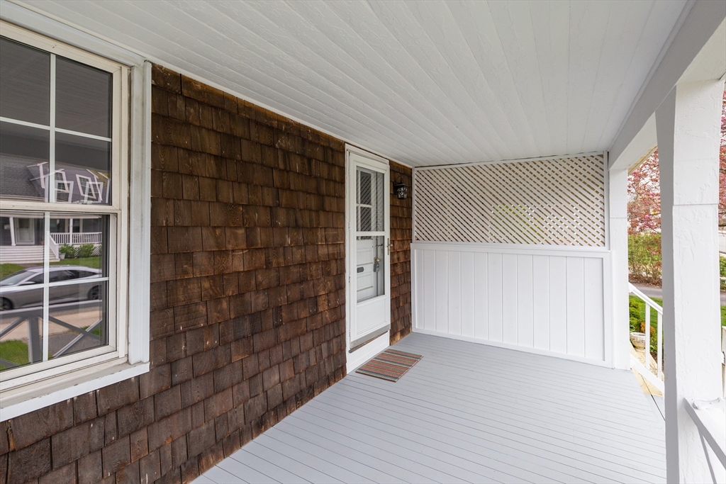 235 Standish Avenue Plymouth, MA 02360 - Photo 15 of 17 a view of an empty room with wooden floor and a window