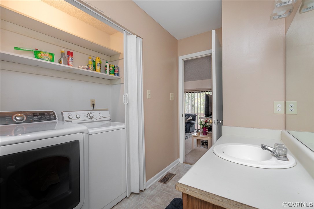 14118 Ridge Creek Road Midlothian, VA 23112 - Photo 29 of 35 a utility room with dryer and washer