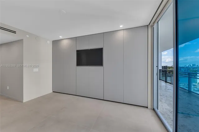 a view of a livingroom with a flat screen tv