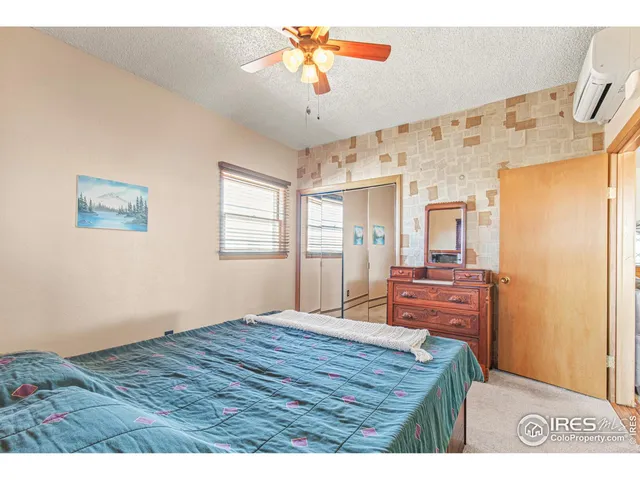 a kitchen with granite countertop a sink cabinets and window
