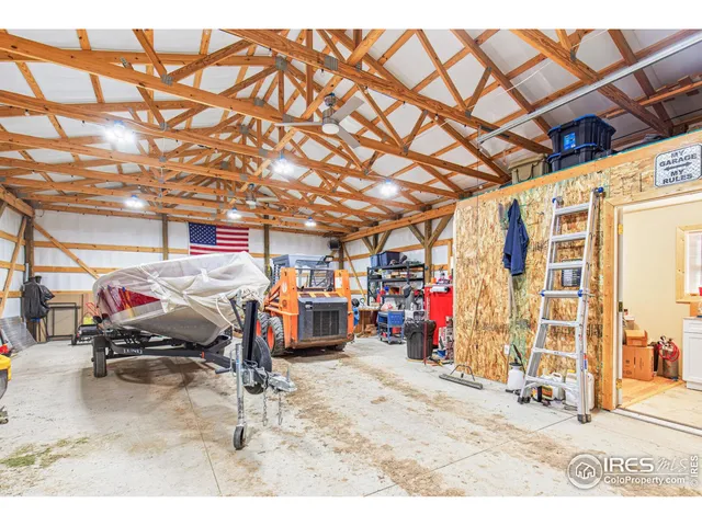 a room with lots of stuff and hardwood floor