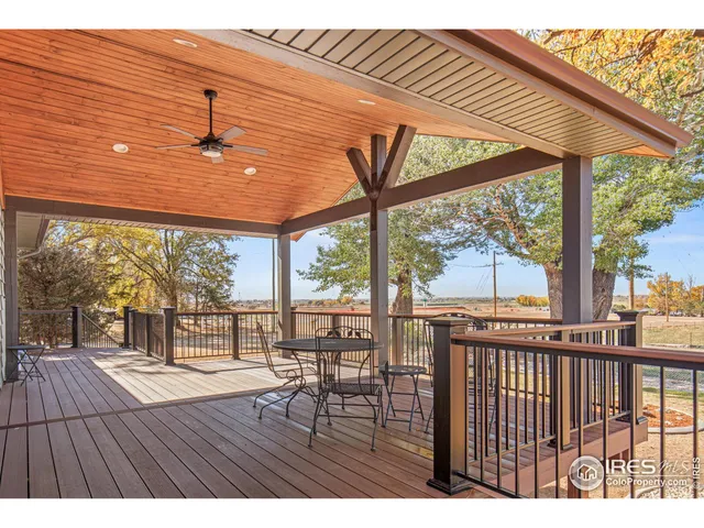 a balcony with wooden floor