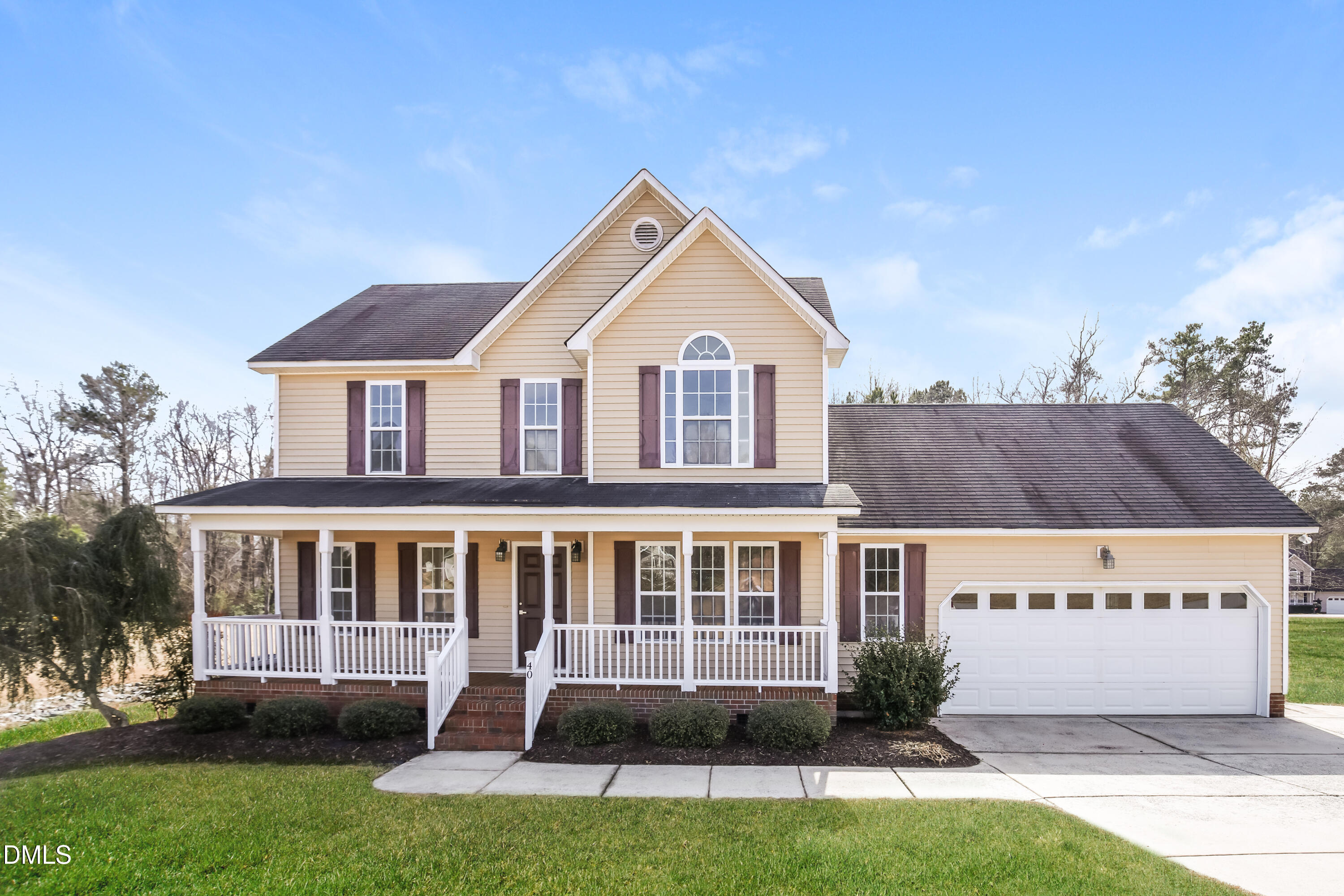 40 Broadhead Court Angier, NC 27501 - Photo 1 of 20 a view of a house with a yard and plants