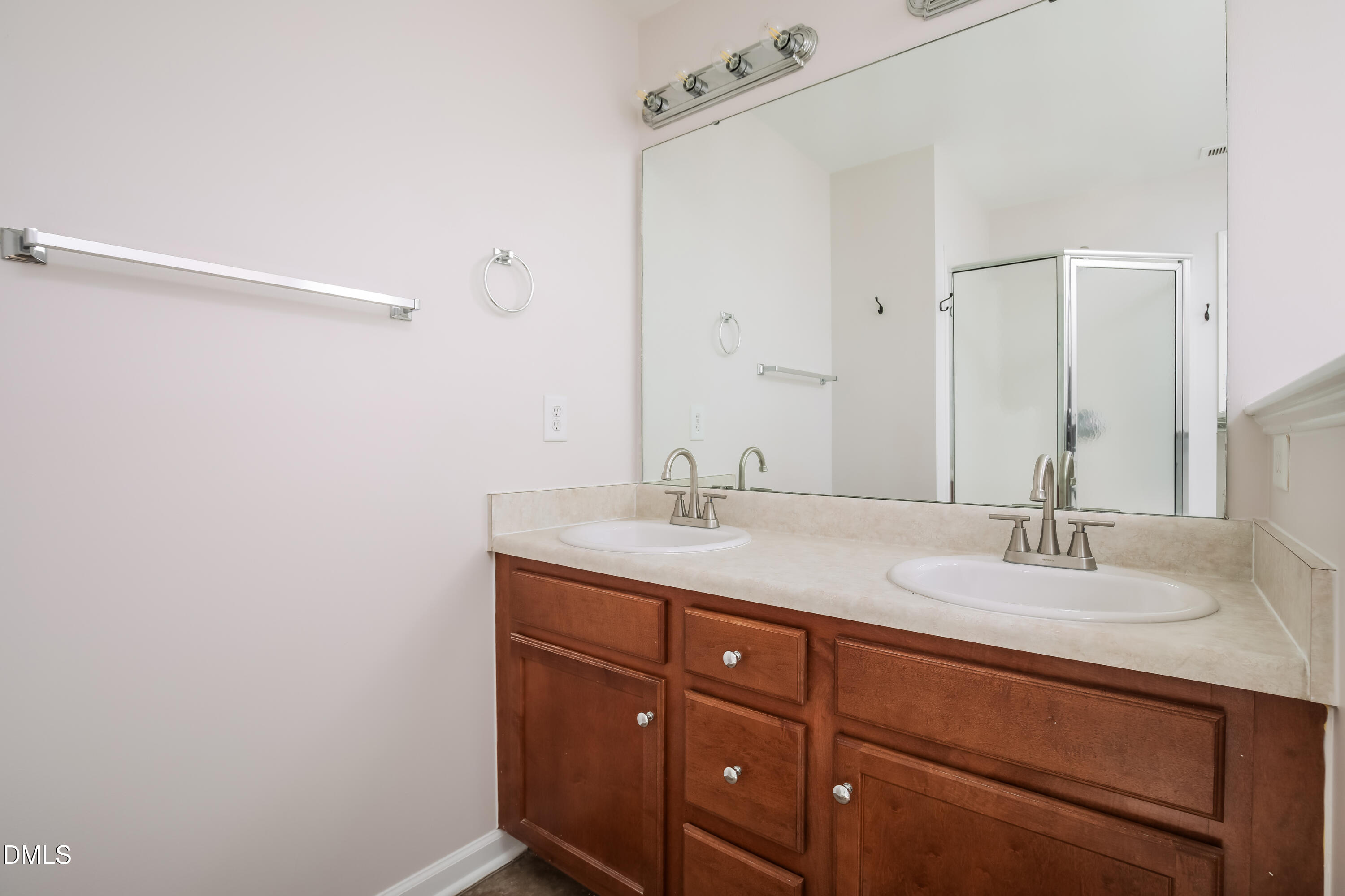 40 Broadhead Court Angier, NC 27501 - Photo 12 of 20 a bathroom with a granite countertop sink and a mirror