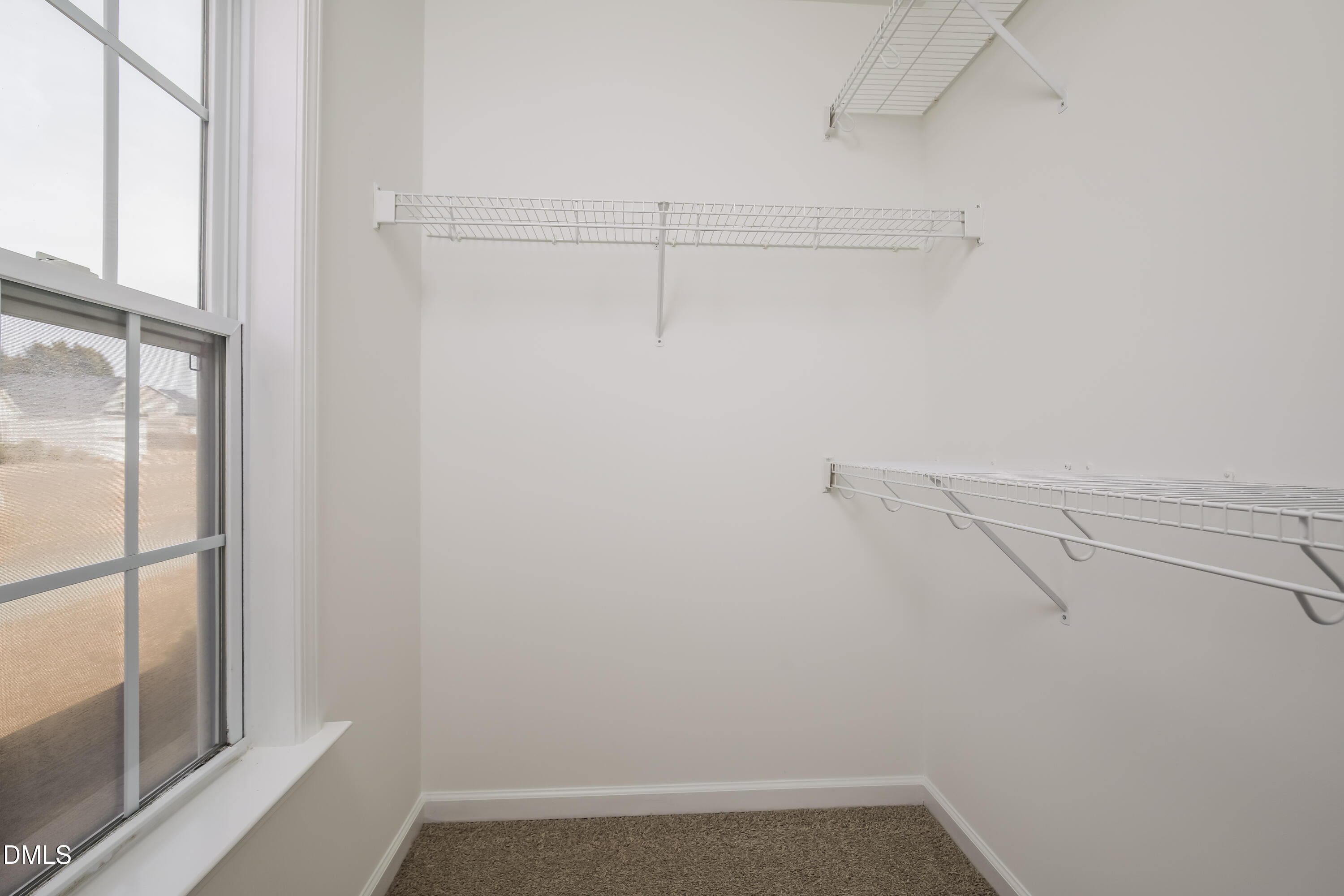 40 Broadhead Court Angier, NC 27501 - Photo 14 of 20 a view of a room with racks on the wall