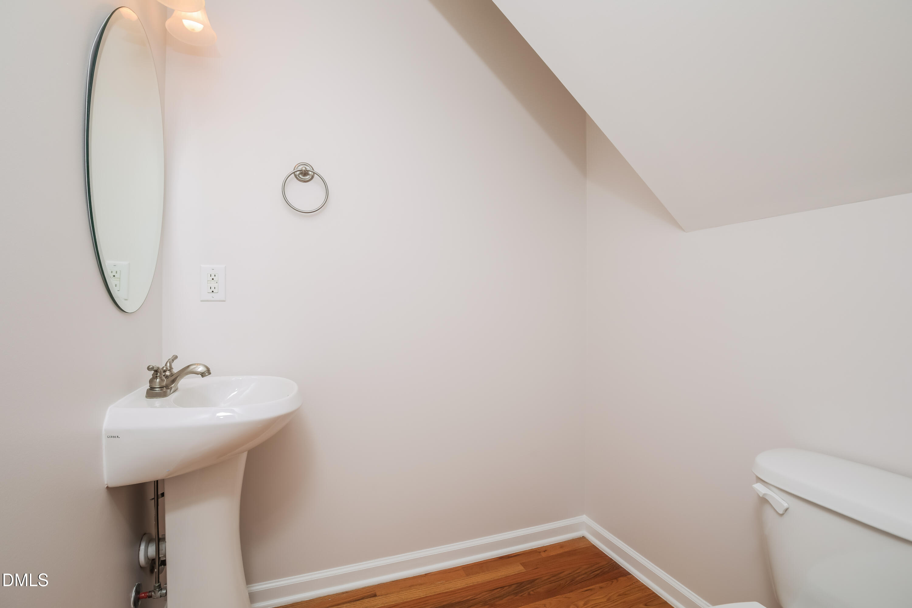 40 Broadhead Court Angier, NC 27501 - Photo 18 of 20 a bathroom with a sink and mirror