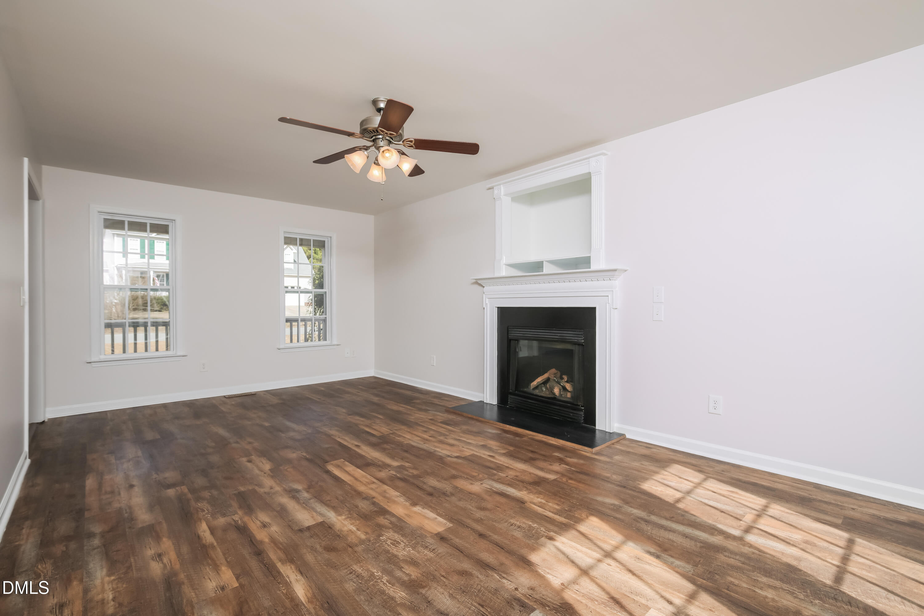 40 Broadhead Court Angier, NC 27501 - Photo 3 of 20 a view of empty room with windows and fireplace