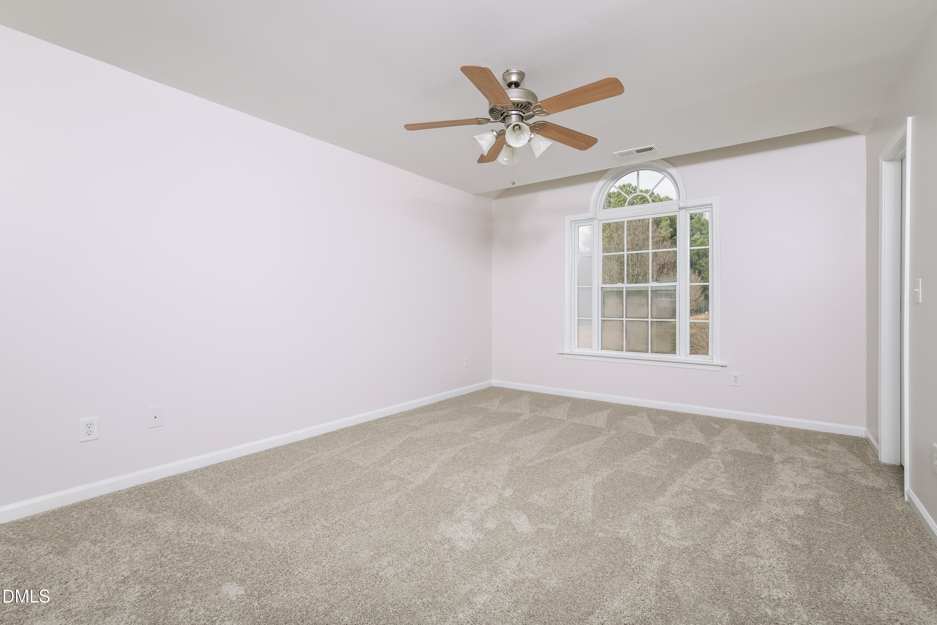 40 Broadhead Court Angier, NC 27501 - Photo 10 of 20 an empty room with windows and fan