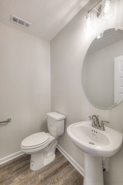 6 Laurel View Street Manchester, TN 37355 - Photo 9 of 11 a bathroom with a toilet sink and mirror