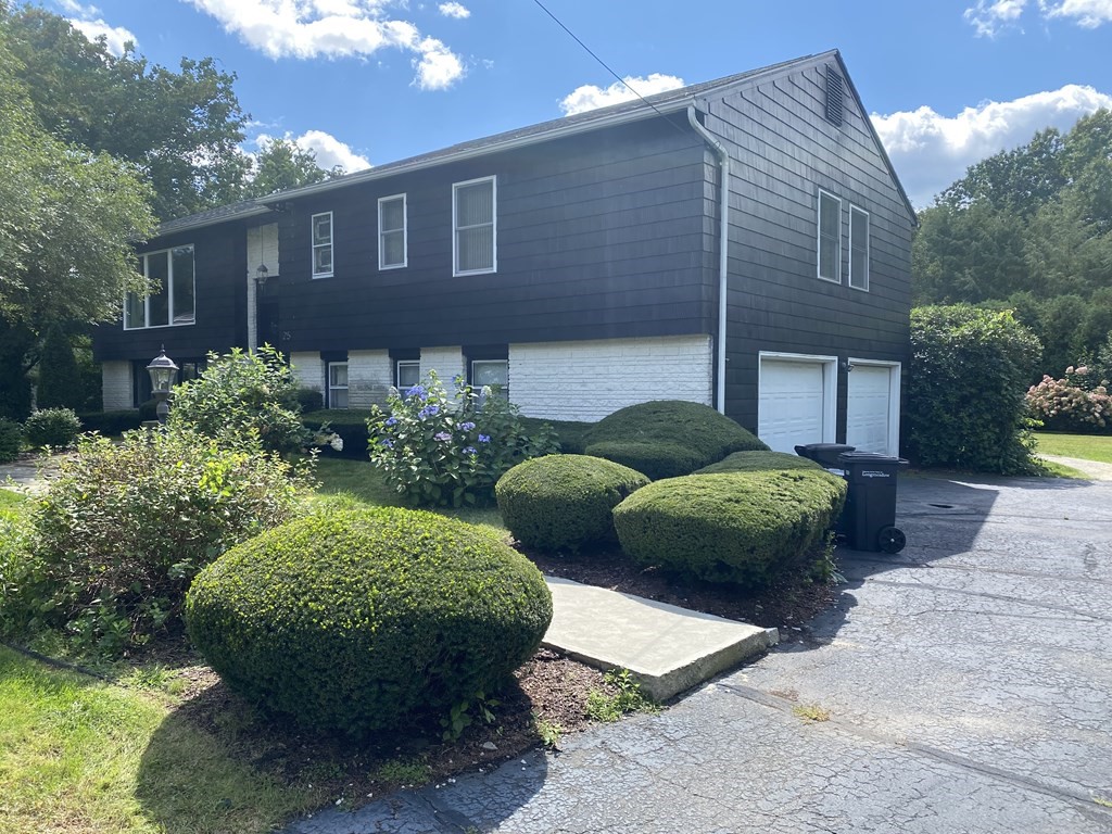 25 Andover Road Longmeadow, MA 01106 - Photo 2 of 2 a view of a house with backyard and garden