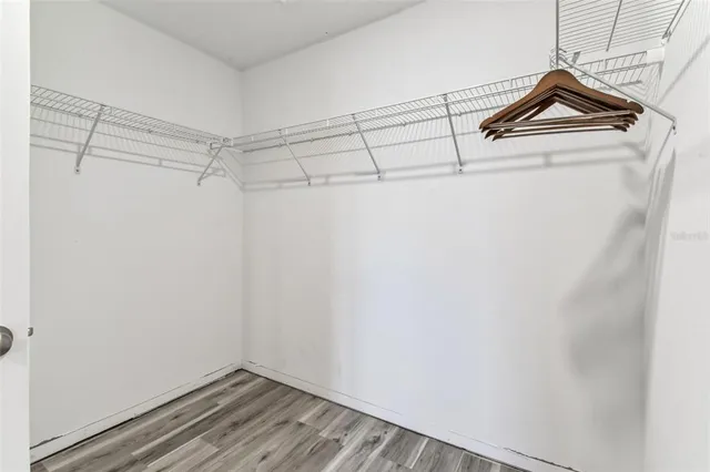 a view of a room with racks on the wall