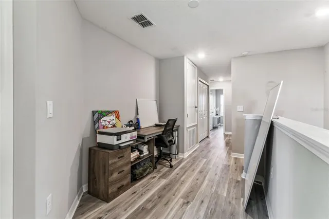 a close view of a utility room with washer and dryer