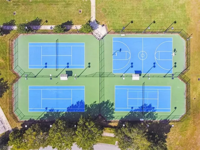 a view of a sign board with a yard