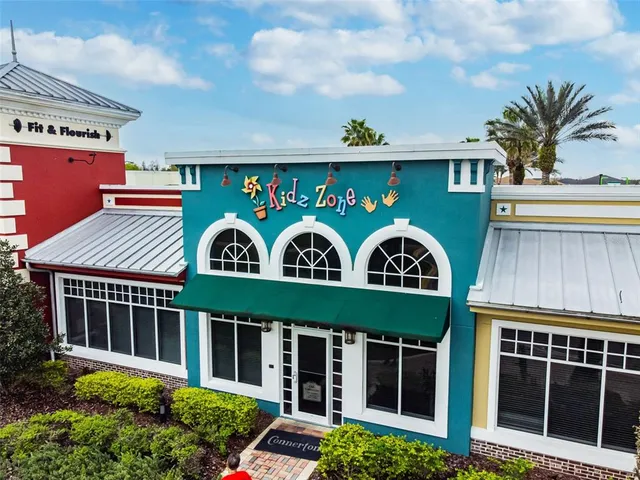 a view of a swimming pool with a yard