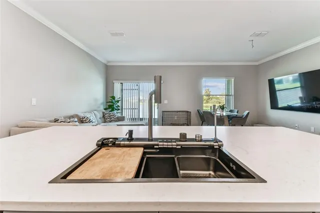 a living room with a couch and a flat screen tv