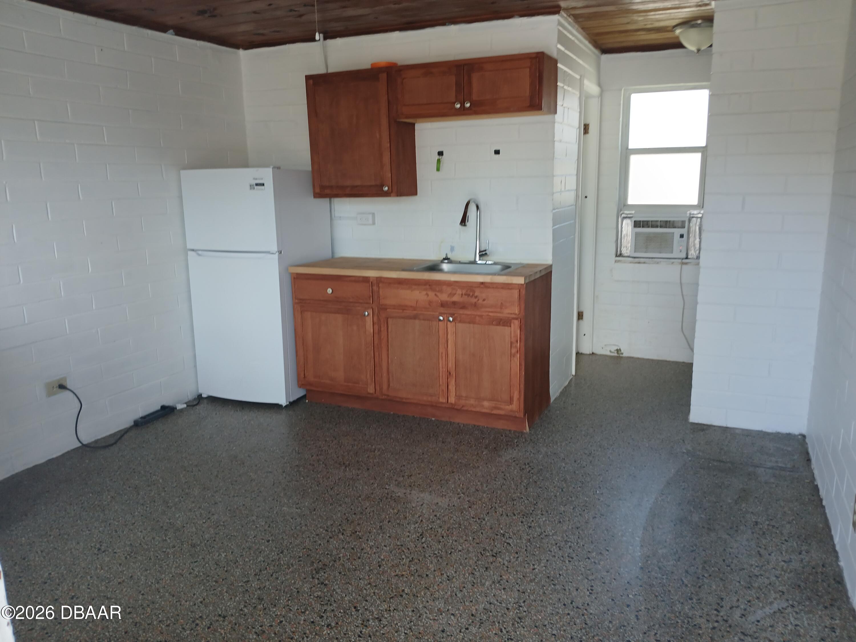 703 South Ridgewood Avenue, Unit 7 Edgewater, FL 32132 - Photo 2 of 4 20260520_134311