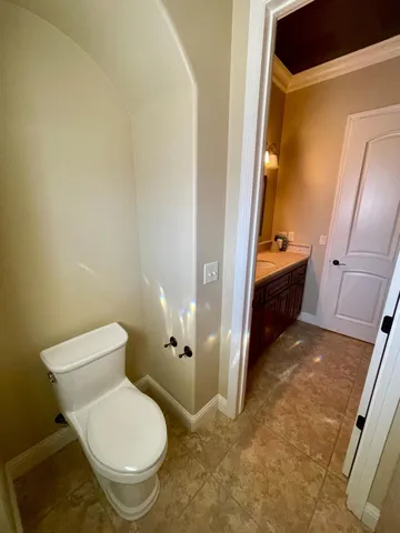 a view of room with a hallway