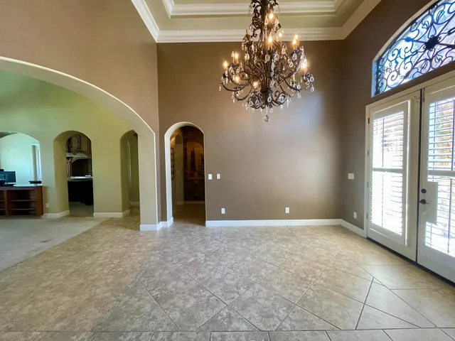 a big room with closet and a fireplace