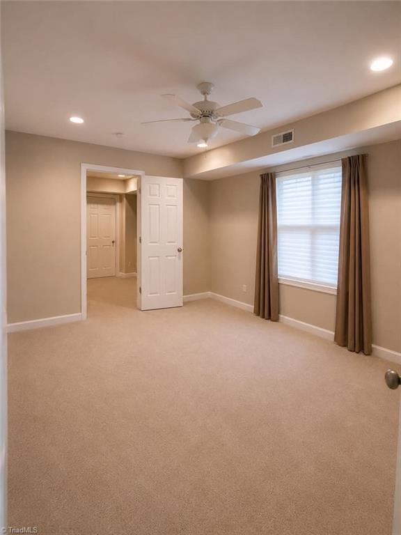 215 Clubmoss Way Clemmons, NC 27012 - Photo 12 of 30 En-suite with full bathroom in basement