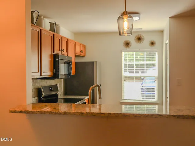 a view of a livingroom with furniture