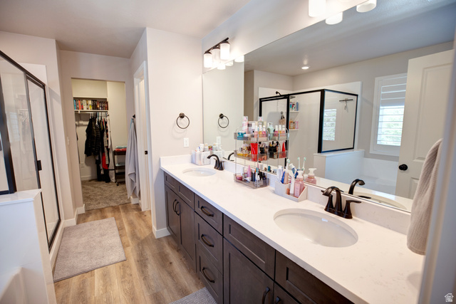 983 South 950 West Provo, UT 84601 - Photo 19 of 56 Dual vanity with white countertop, undermount sinks, and dark bronze fixtures