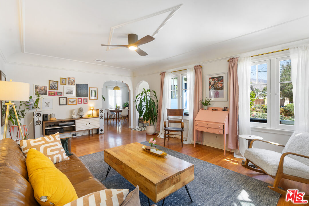 1955 Garfield Avenue Pasadena, CA 91104 - Photo 17 of 55 a living room with furniture a rug and a window