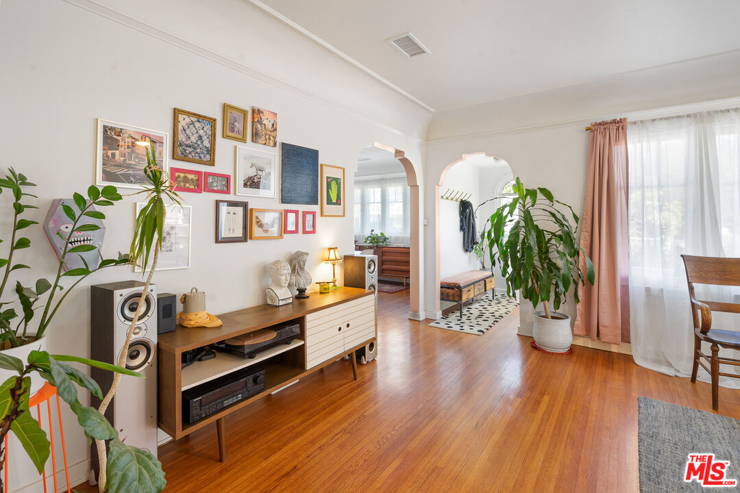 1955 Garfield Avenue Pasadena, CA 91104 - Photo 19 of 55 a living room with furniture and a wooden floor