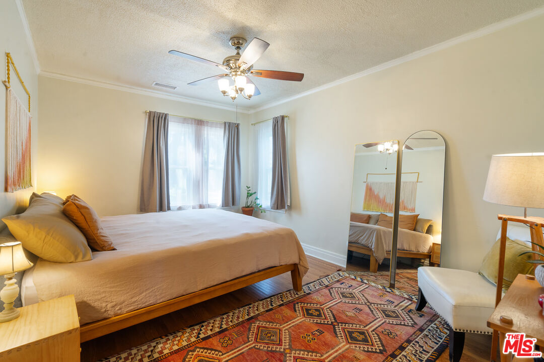 1955 Garfield Avenue Pasadena, CA 91104 - Photo 21 of 55 a bedroom with a bed and window