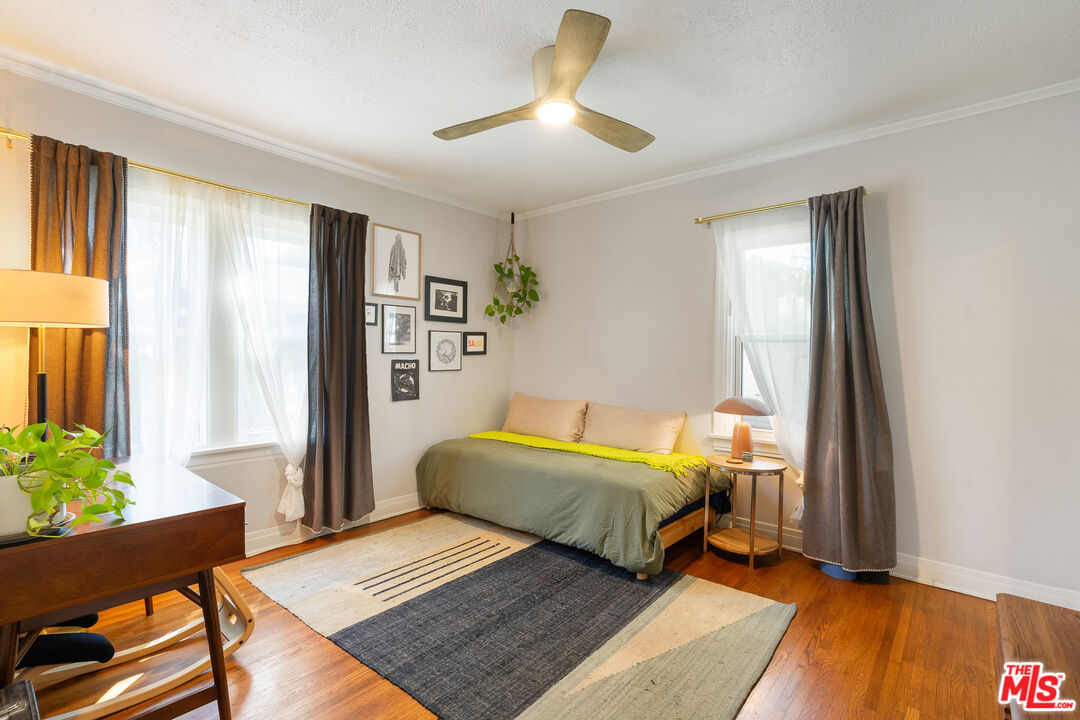 1955 Garfield Avenue Pasadena, CA 91104 - Photo 30 of 55 a bedroom with two beds and a potted plant