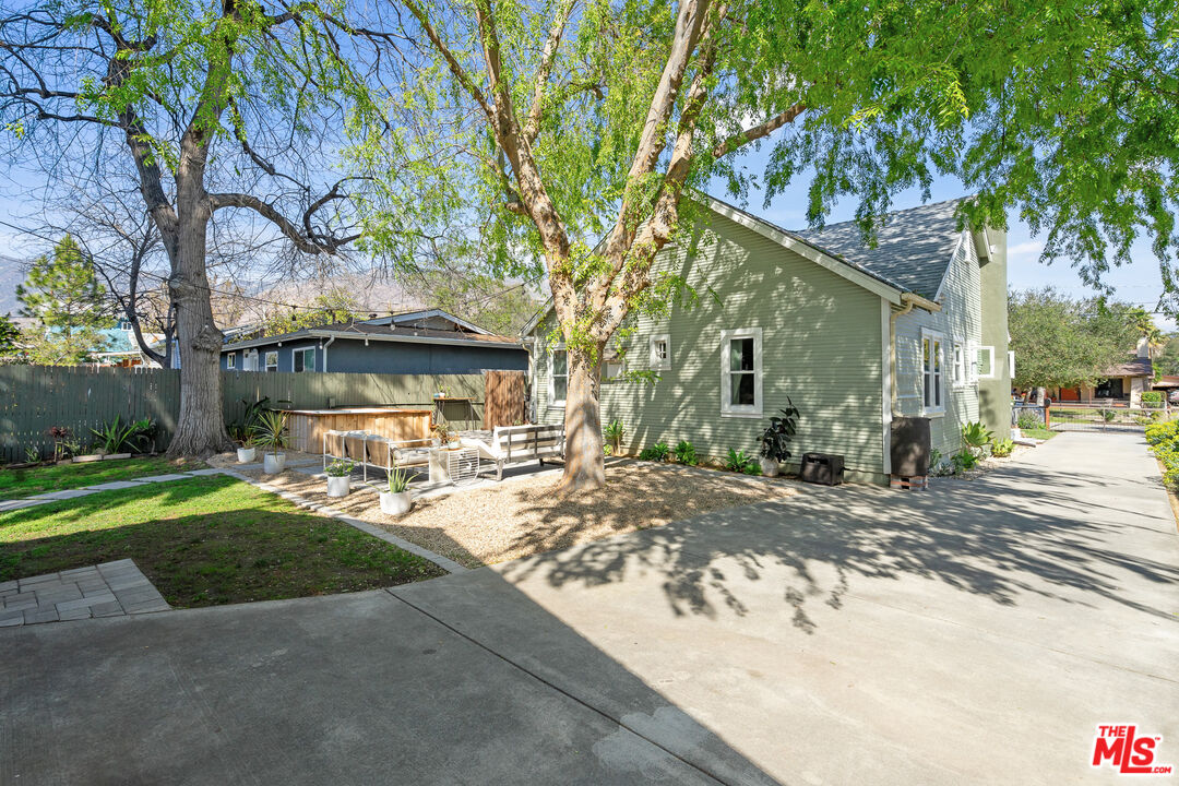 1955 Garfield Avenue Pasadena, CA 91104 - Photo 49 of 55 a view of a house with yard and tree s