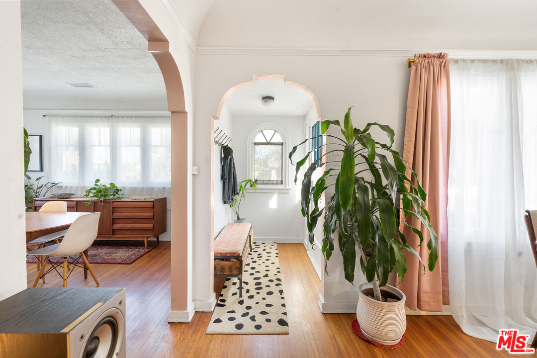 1955 Garfield Avenue Pasadena, CA 91104 - Photo 8 of 55 a living room with furniture and a potted plant