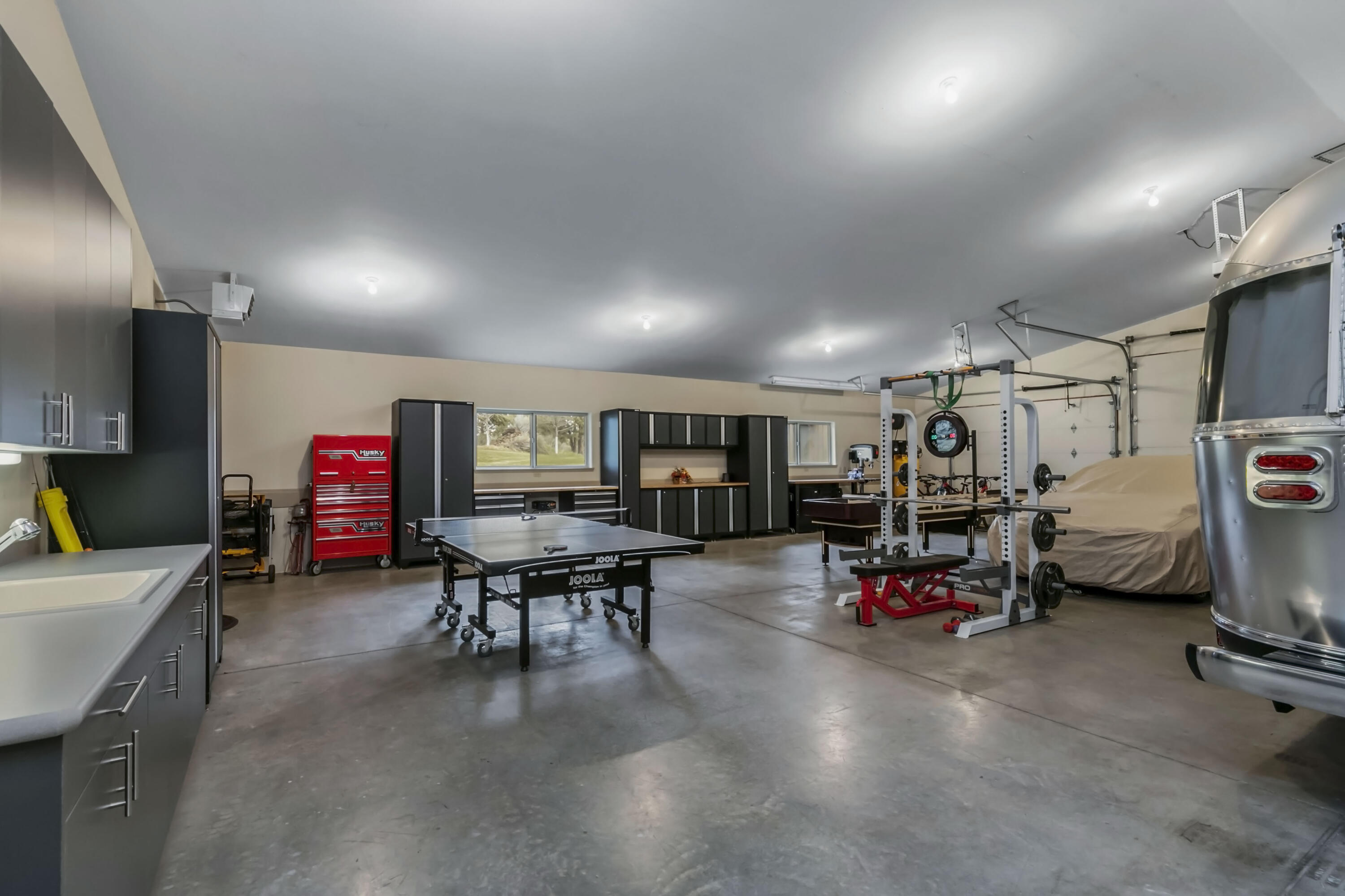69015 Hurtley Ranch Road Sisters, OR 97759 - Photo 72 of 88 1,826 SF RV garage/shop attached to guest quarters with 3 bays, workbench, storage, 2 heaters, 220v