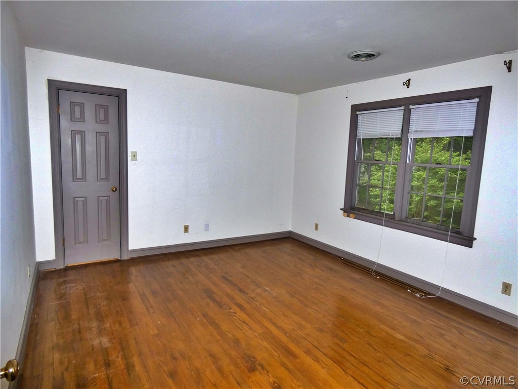 14011 Chepstow Road Midlothian, VA 23113 - Photo 26 of 49 a view of a room with wooden floor and window