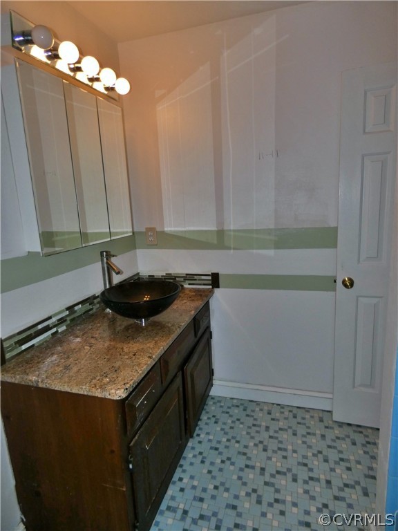 14011 Chepstow Road Midlothian, VA 23113 - Photo 30 of 49 a bathroom with a granite countertop sink and a mirror