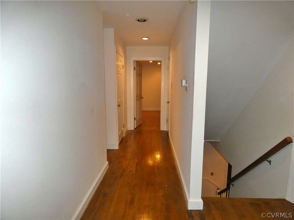 14011 Chepstow Road Midlothian, VA 23113 - Photo 32 of 49 a view of a hallway with wooden floor and staircase