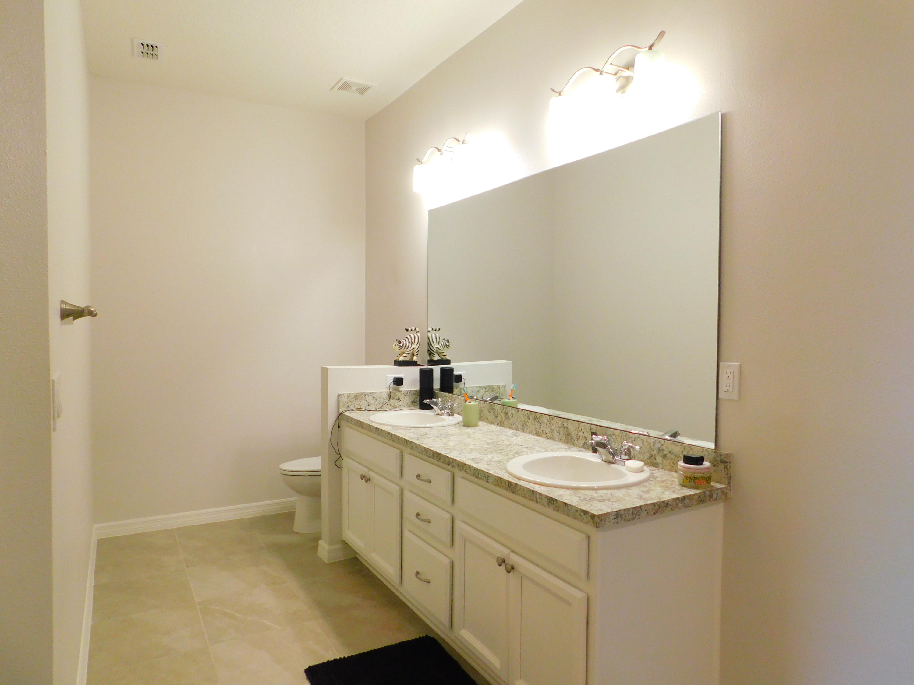 1465 Southeast Portillo Road Port St. Lucie, FL 34952 - Photo 13 of 25 RozzoMstrBath1