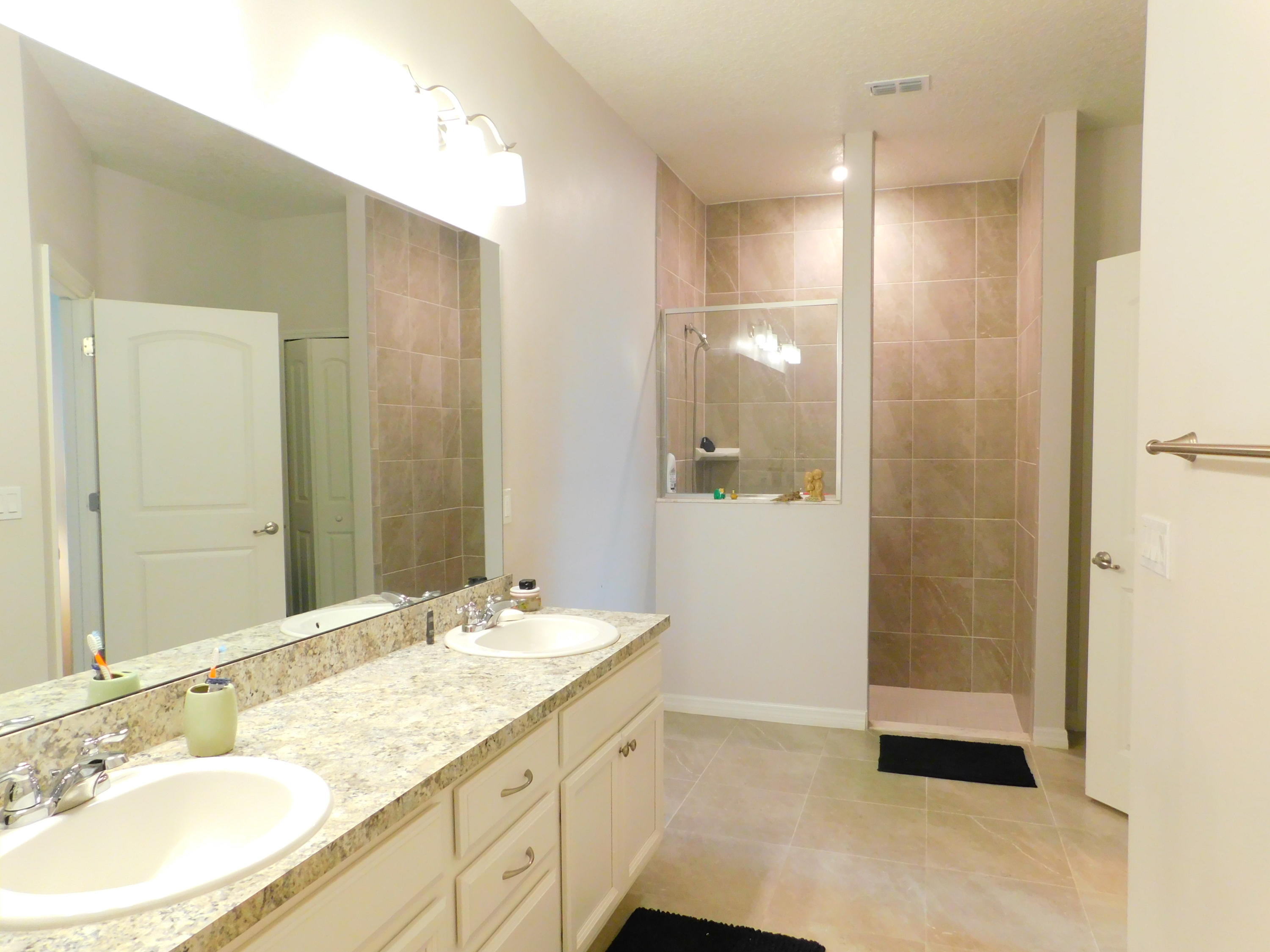 1465 Southeast Portillo Road Port St. Lucie, FL 34952 - Photo 14 of 25 RozzoMstrBath2