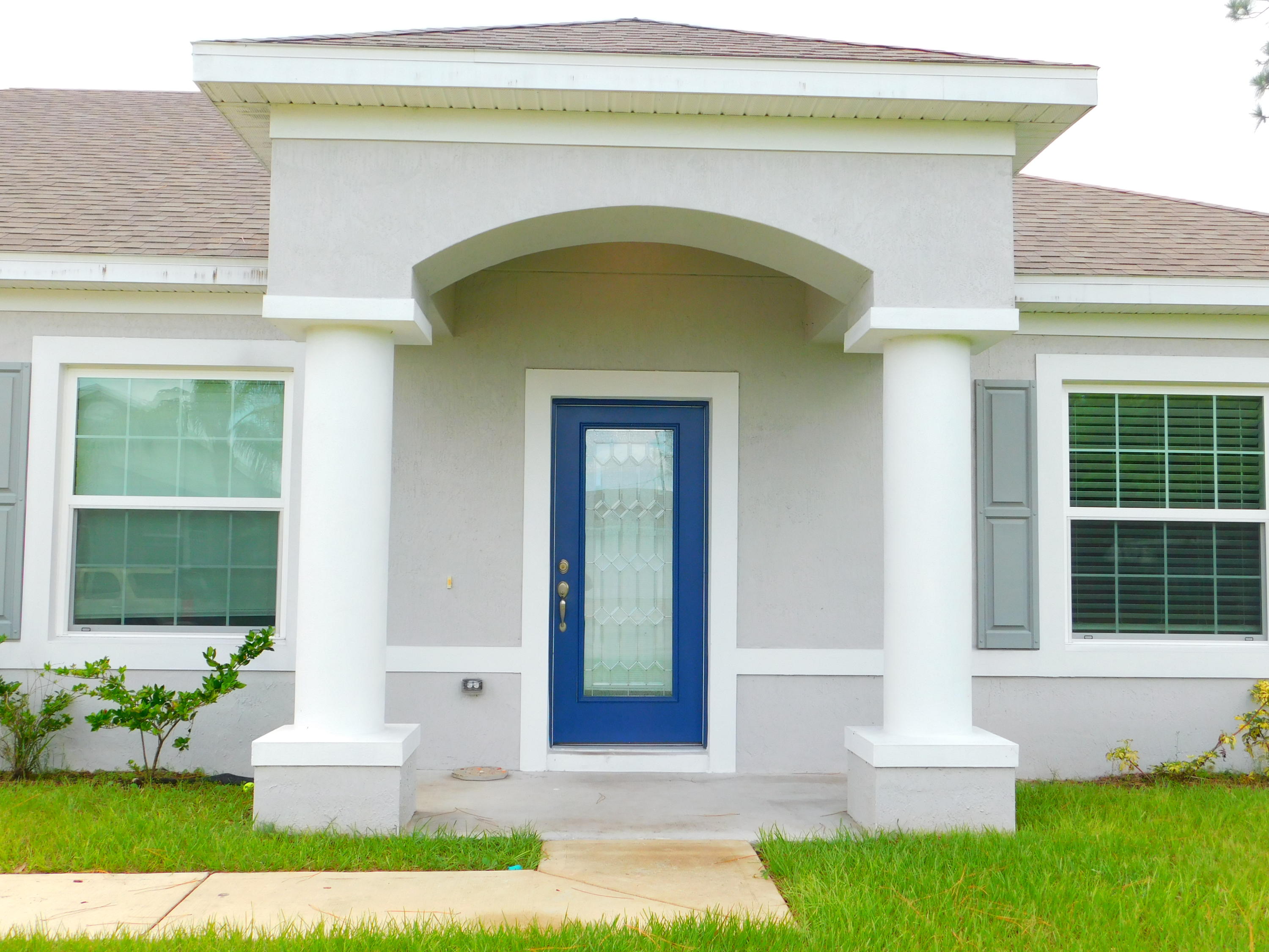 1465 Southeast Portillo Road Port St. Lucie, FL 34952 - Photo 2 of 25 RozzoFrontEntry