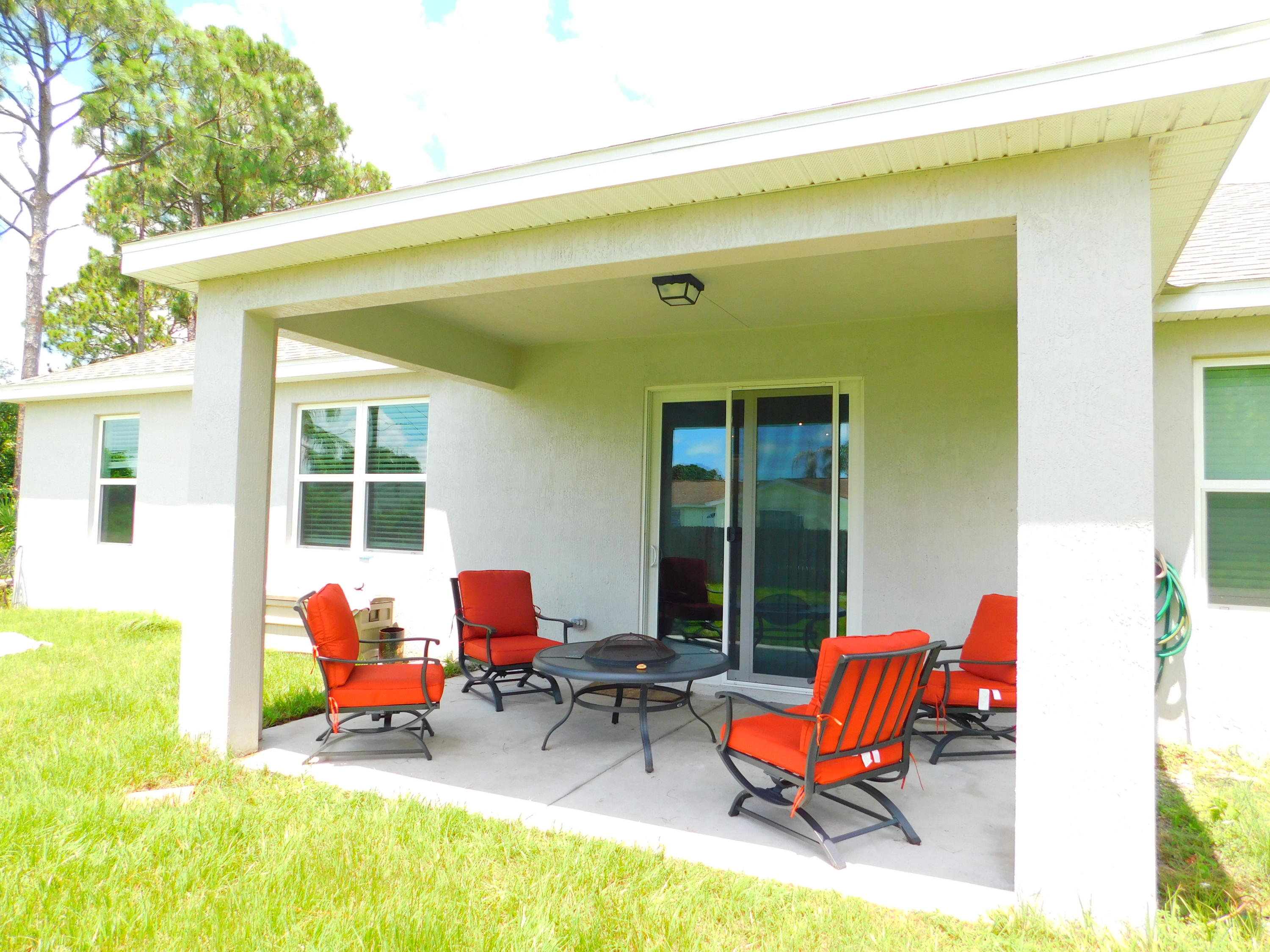 1465 Southeast Portillo Road Port St. Lucie, FL 34952 - Photo 3 of 25 RozzoCoveredPatio