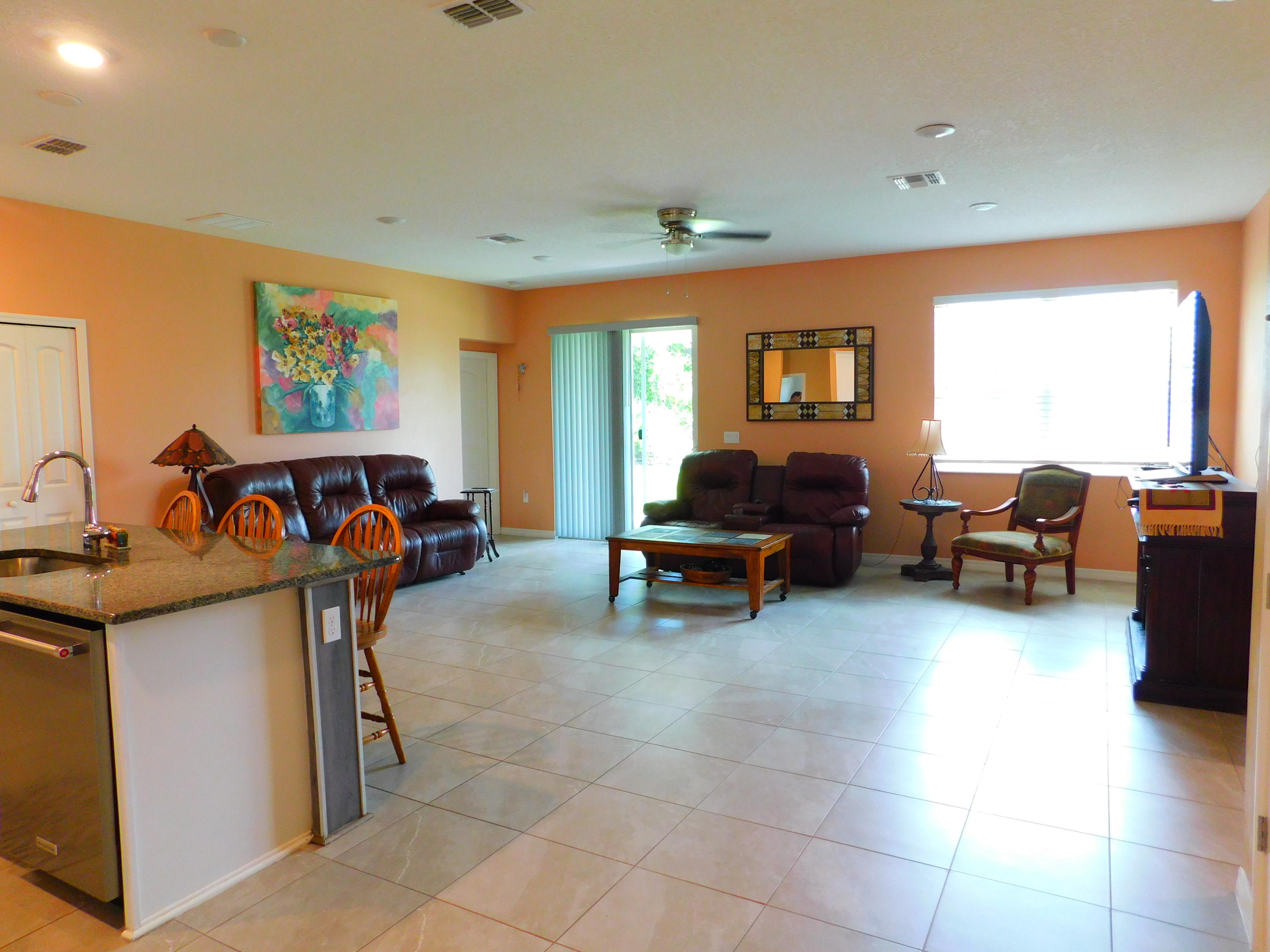 1465 Southeast Portillo Road Port St. Lucie, FL 34952 - Photo 8 of 25 RozzoEntry2Kitch-Fam