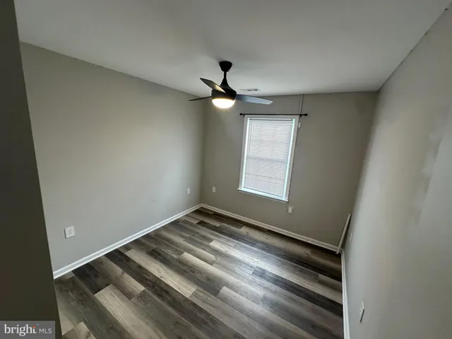 a bathroom with a toilet a sink and a shower