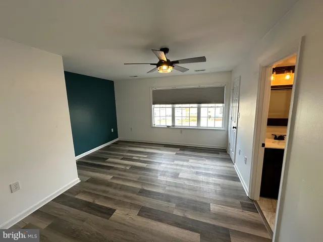 a bathroom with a shower and a toilet